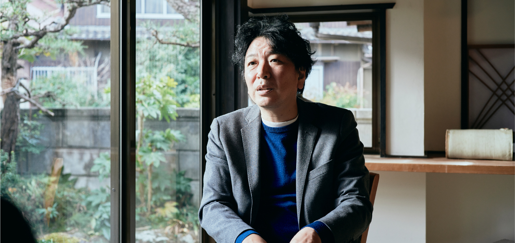 勉強堂代表取締役・門田治己氏の肖像。広島・山口の魅力発信サイト「てみて」掲載の公式写真。