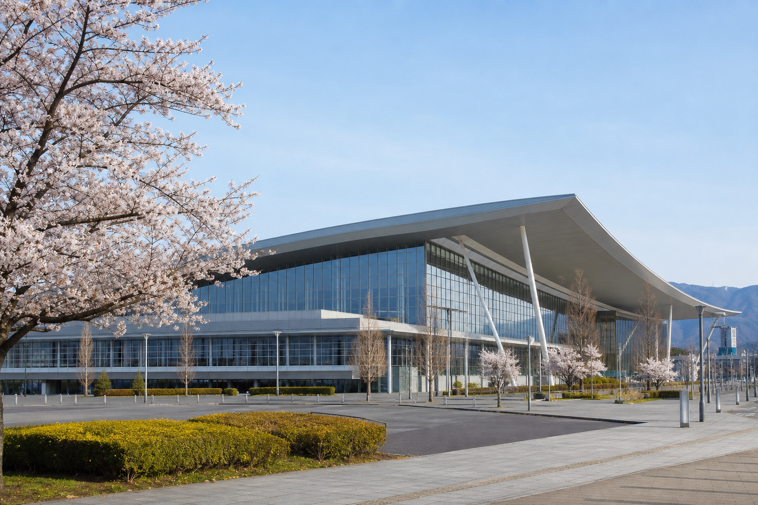 広島県福山市の産業交流・コンベンション施設を想定した外観イメージ。福山ビッグ・ローズ周辺の大型ホール施設の雰囲気を示す編集部作成ビジュアル